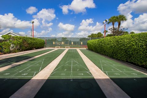 Tiny photo for 100 Lake Rebecca Drive, West Palm Beach, FL 33411 (MLS # B26036901)
