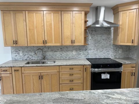 Photo of 100 Lake Rebecca Drive, West Palm Beach, FL 33411 (MLS # B26036901)