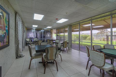 Tiny photo for 100 Lake Rebecca Drive, West Palm Beach, FL 33411 (MLS # B26036901)