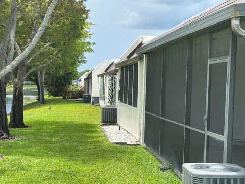 Tiny photo for 100 Lake Rebecca Drive, West Palm Beach, FL 33411 (MLS # B26036901)