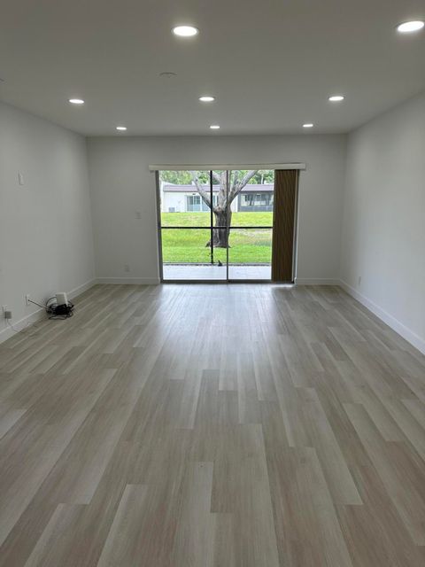Tiny photo for 100 Lake Rebecca Drive, West Palm Beach, FL 33411 (MLS # B26036901)