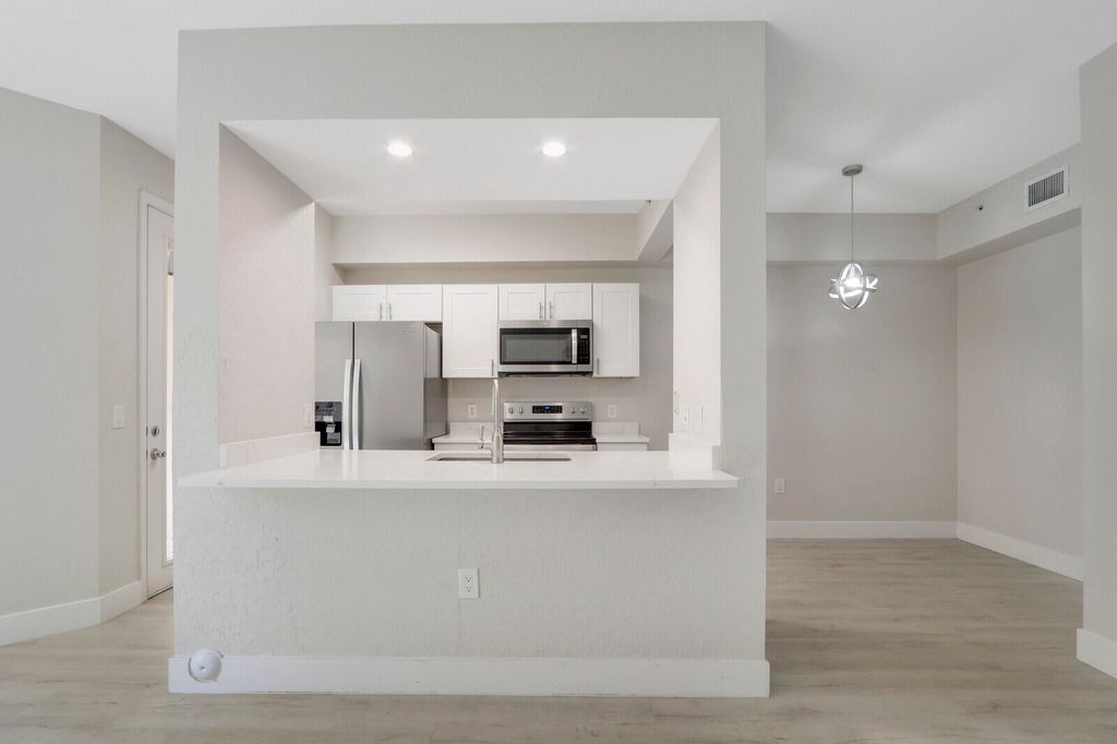 Photo of 11017 Legacy Lane #103, Palm Beach Gardens, FL 33410 (MLS # R10972414)