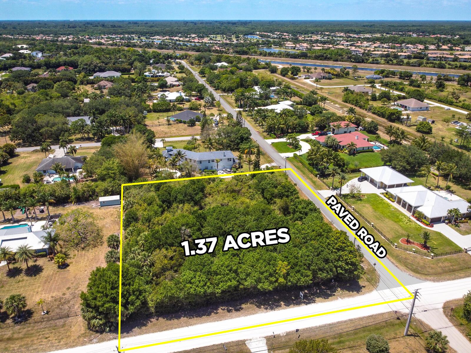 This beautiful 1.37-acre corner lot is one of the last remaining vacant parcels on a paved road in Palm Beach Country Estates. This lot fronts a paved road on one side (167th Ct) and can be accessed entirely via paved roads by taking 165th to 75th Way to 167th. Unlike most other acreage subdivisions, Palm Beach Country Estates has city water available for hookup. This is one of your last chances to own a premium lot on a paved road in this subdivision.