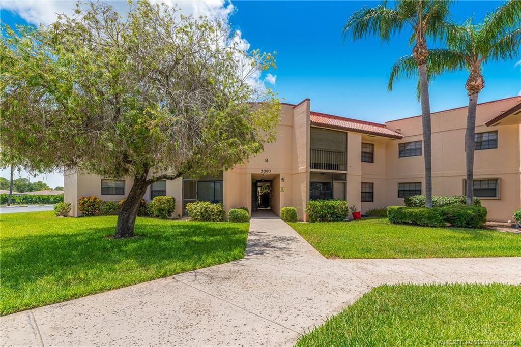 Photo of 2083 NE Collins Circle #8-60, Jensen Beach, FL 34957 (MLS # R10852657)