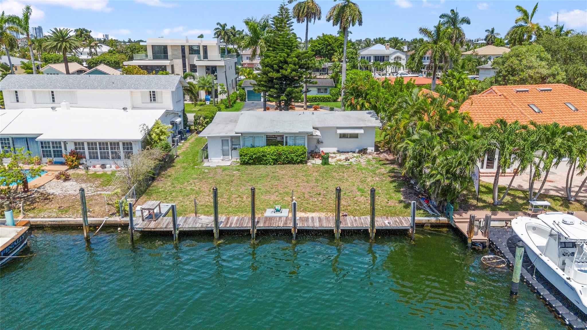 The List Price of $2,000,000.00 is the Appraised Value and is for reference purposes only. The final bid price for the Property shall be determined by competitive bidding at the Auction and is subject to the approval of the Estate’s Personal Representative. The Property is sold "As-Is, Where-Is" with no representations, warranties or guarantees of any kind, whether stated or implied. Buyers must conduct their own due diligence. The Live Auction Event will take place at 11:00 AM ET on Friday, October 17th, 2025, at the Renaissance Fort Lauderdale Marina Hotel. There will be a 6% Buyer’s Premium added to the final bid.
Fisher Auction Company is pleased to present this 3 bedroom, 2 Bathroom Waterfront Home on a Large 7,700± SF Lot located in the Heart of Lauderdale Harbours.