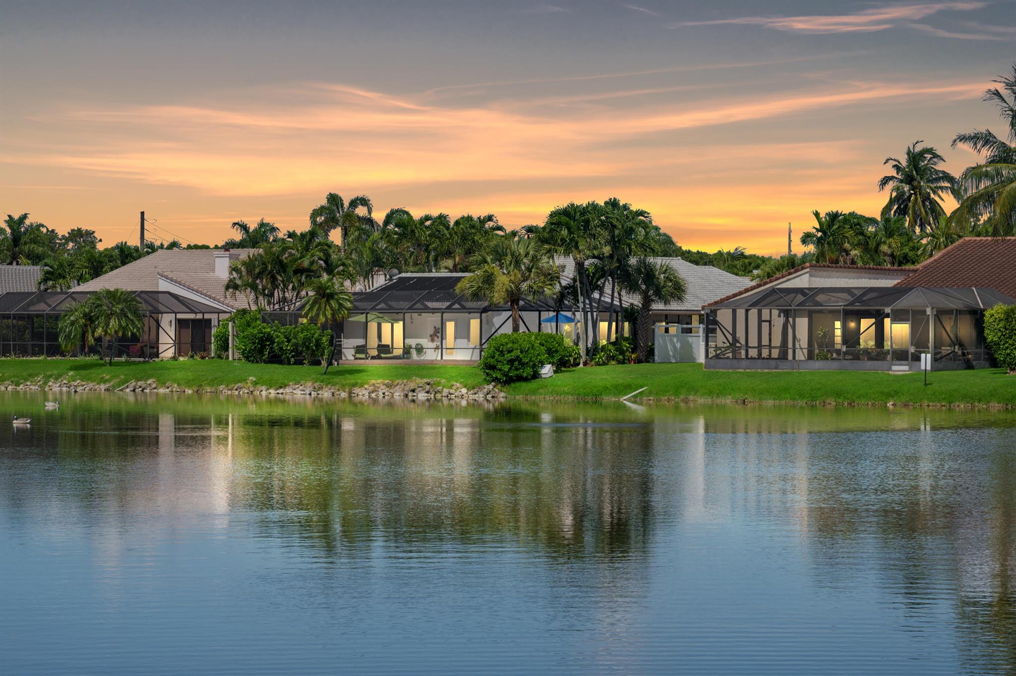 Stunning Lakefront views with an East exposure from one of few gated communities in EAST BOCA! Highly Desired Boca Lake Estates. One of only 31 homes directly on this private lake community minutes to the Beach, Downtown Delray & Boca Raton. Heated Pool, Impact Glass, Newer A/C & Water Heater, Newer concrete paver driveway, Lightening Rods placed on roof,This home offers a large open floor plan with pool enclosure and serenity surrounding the private gated grounds. A MUST SEE!