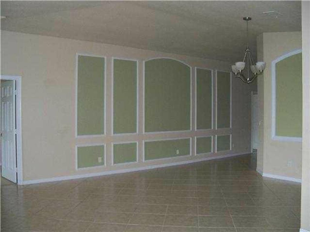 Photo of 1887 SW Newport Isles Boulevard, Port Saint Lucie, FL 34953 (MLS # R11104753)