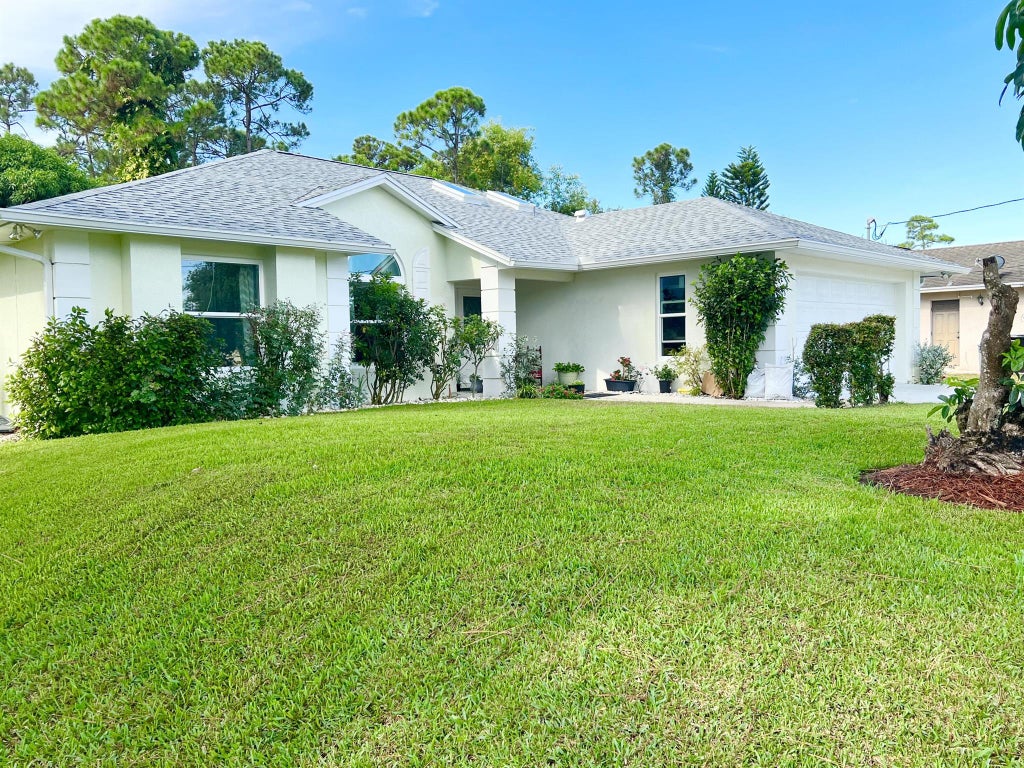 Photo of 1856 SW Kimberly Avenue Ave, Port Saint Lucie, FL 34953 (MLS # R10829518)