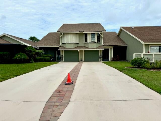Photo of 1565 SE Crayrich Court, Port Saint Lucie, FL 34952 (MLS # R10999602)