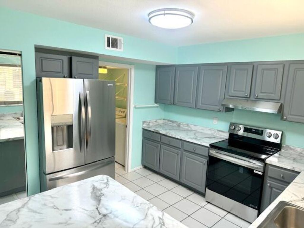 Photo of 1565 SE Crayrich Court, Port Saint Lucie, FL 34952 (MLS # R10999602)