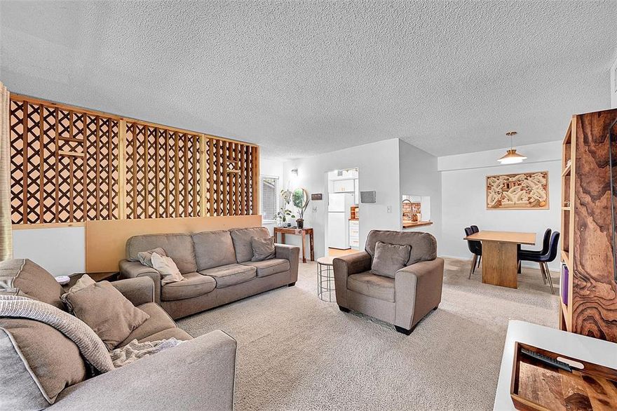 Nestled in a serene, tree-lined community, this spacious 2BR/2BA lakeview condo offers a peaceful retreat with beautiful natural surroundings. The primary suite features a walk-in closet and en-suite bath. Enjoy lake views from your private balcony, plus added convenience with in-unit laundry and extra storage. Community amenities include a pool, gym, sauna, tennis, racquetball, clubhouse, and BBQ/picnic areas. Ideally located near shopping, dining, parks, the Turnpike, Calvary Christian Academy, Broward College, and just minutes to the beach. No Special Assessments.