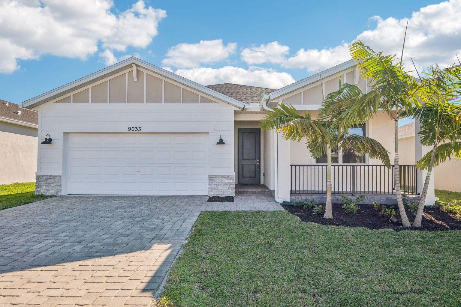 Be the first to live in this private lakeview new construction home, available in a gated community located between Tradition and St. Lucie West/PGA. Easy access to I-95, perfect for commuters, this contemporary 4 Bed 3 Bath home is spacious with a huge open kitchen - appointed with white cabinetry, quartz countertops and backsplash, tile throughout the entire home (no carpet), & 8' doors - enjoy this classy yet modern design for years to come. Have peace of mind with hurricane impact windows & energy efficient design saving you money each month with spray foam insulation & smart home technology package. Turnkey move in ready with washer/dryer, window blinds, gutters, lawncare included, and a screen enclosed covered lanai in the backyard overlooking the lake & preserve. Low HOA/No CDD