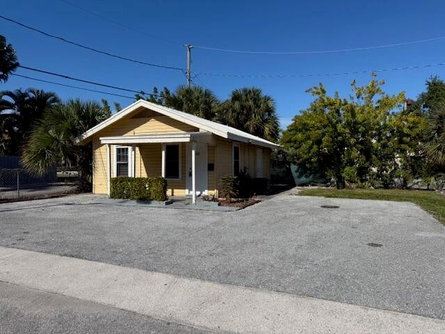 Photo of 400 Metcalf Court, West Palm Beach, FL 33407 (MLS # B26077580)