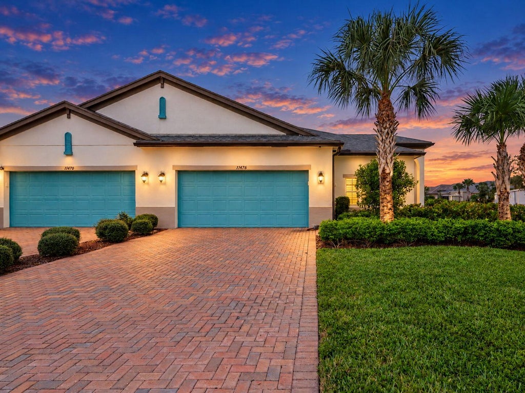 Photo of 11476 SW Lake Park Drive, Port Saint Lucie, FL 34987 (MLS # B26077970)