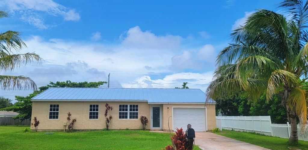 Photo of 2901 SE Melaleuca Boulevard, Port Saint Lucie, FL 34952 (MLS # R10738487)