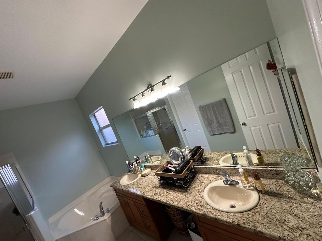 Photo of 942 NW Leonardo Circle, Port Saint Lucie, FL 34986 (MLS # B26007661)