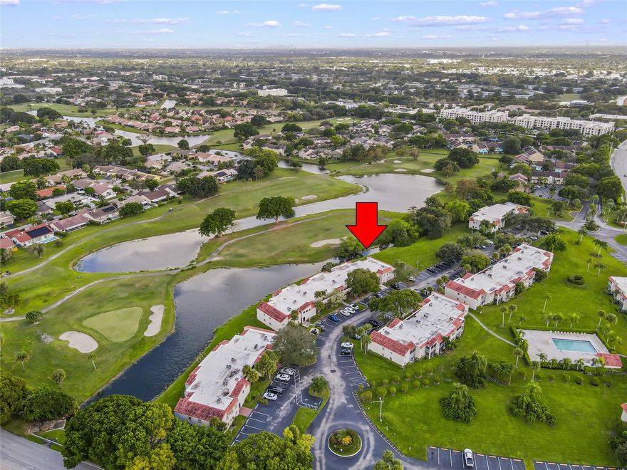 Schedule to See This Spacious 3-Bedroom/2-Bath Unit in the Serene Community of Cypress at Woodmont Boasting Tranquil Water and Golf Course Views from a Screened Patio, this First-Floor End-Unit Offers a Peaceful Retreat Ideal for all Ages. Step into the Modern Kitchen Outfitted with Updated Appliances. Enjoy the Convenience of a Full-Size Washer and Dryer, and the Comfort of a Newly Installed Air-Conditioning System. With Tile Flooring Throughout, this Home Combines Elegance with Easy Maintenance. One Assigned Parking Space, Ample Open Guest Parking, Community Pool, and So Much More! Ideally Located, Providing Quick Access to Nearby Shopping, Services, Schools, the Sawgrass Expressway and Florida Turnpike. Don’t Miss the Opportunity to Make This Your Dream Home Today!!