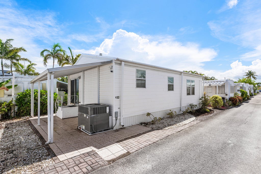 Photo of 13 Hibiscus Drive #H, Briny Breezes, FL 33435 (MLS # B26071946)