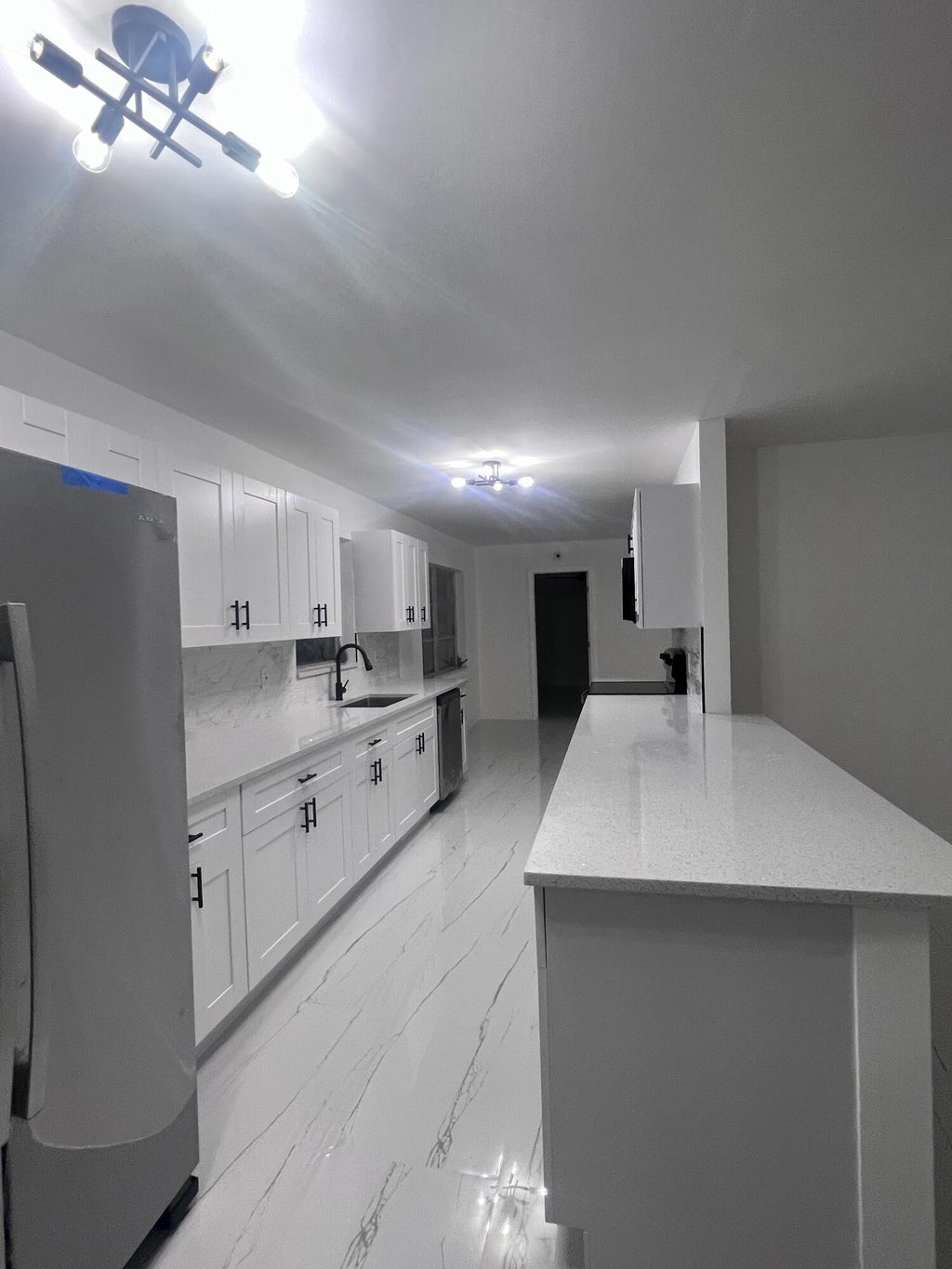 Photo of 18 NE Avenue I, Belle Glade, FL 33430 (MLS # R10928409)
