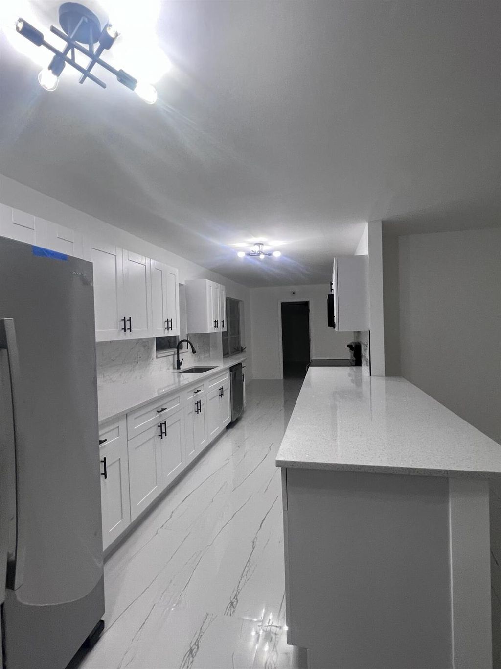 Photo of 18 NE Avenue I, Belle Glade, FL 33430 (MLS # R10928409)