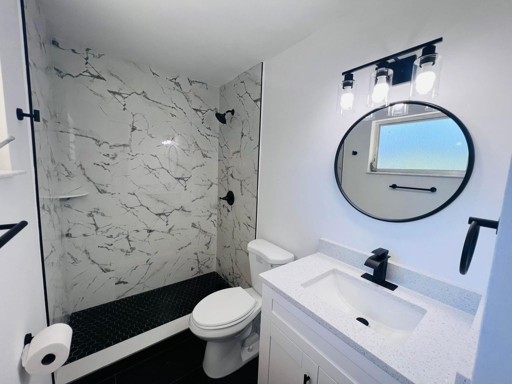 Photo of 18 NE Avenue I, Belle Glade, FL 33430 (MLS # R10928409)