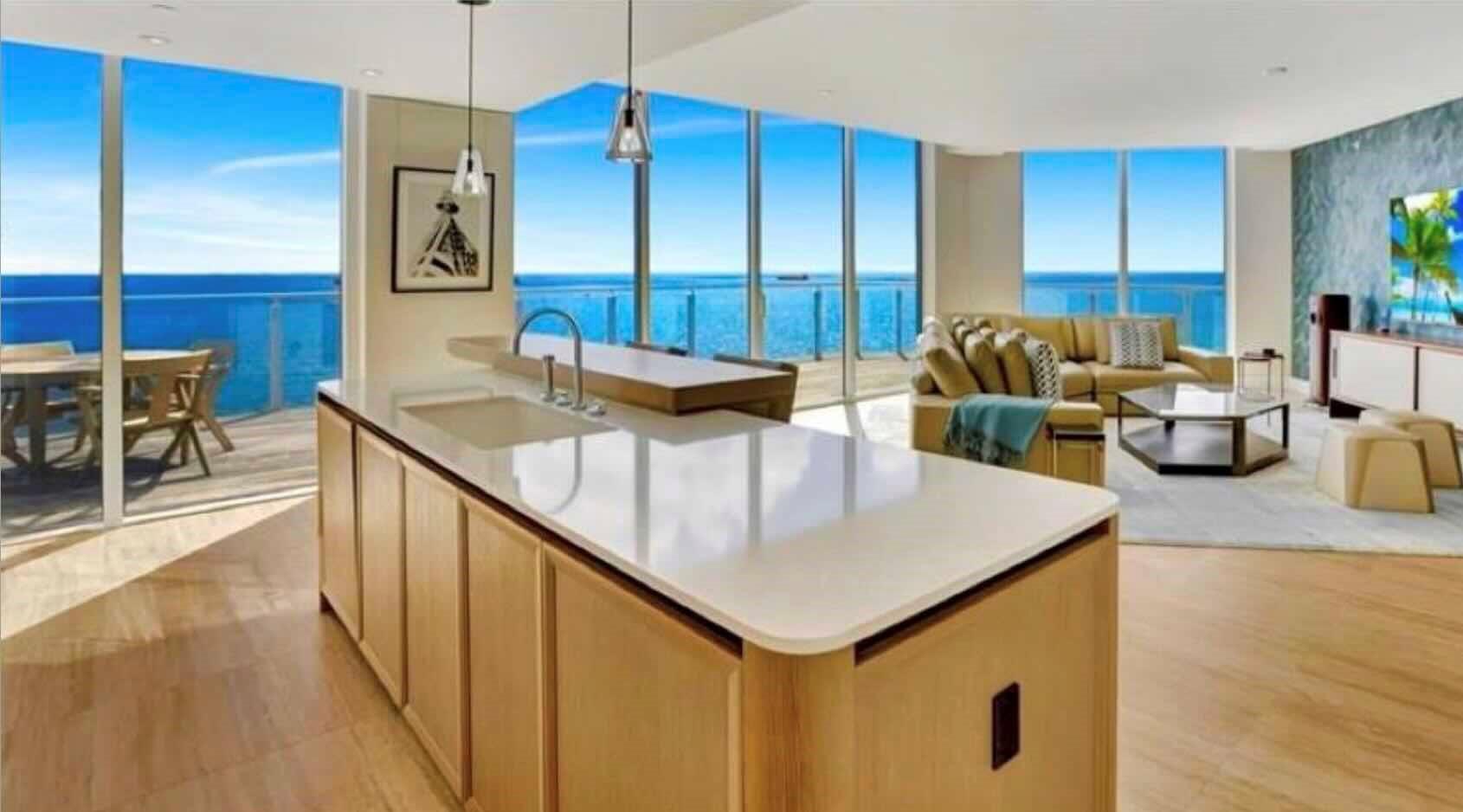 DIRECT OCEANFRONT SOUTHEAST CORNER WRAP-AROUND BALCONY FOUR SEASONS PRIVATE RESIDENCES, 4 bedroom, 4 1/2 bath and a southeastern exposure with direct ocean views . Dramatic floor to ceiling glass and gracious open wrap around terrace affords you ample natural light throughout the home. Gourmet kitchen with custom lacquered cabinetry, Sub Zero and Wolf appliances. Abundant illuminated closet space throughout this luxury residence. Baths are adorned with signature marble, custom oak cabinetry, and brushed nickel Waterworks fittings. Seamless/capless glass rails maximize your unobstructed views of the ocean. Assigned parking, either self park or valet as an exclusive VIP amenity offered to all residents.