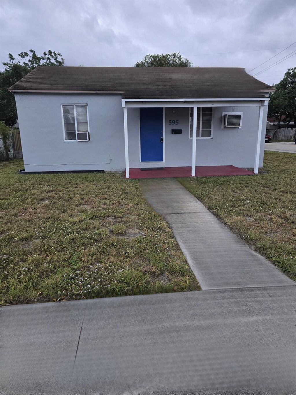 Photo of 595 W 3rd Street, Riviera Beach, FL 33404 (MLS # R11144765)