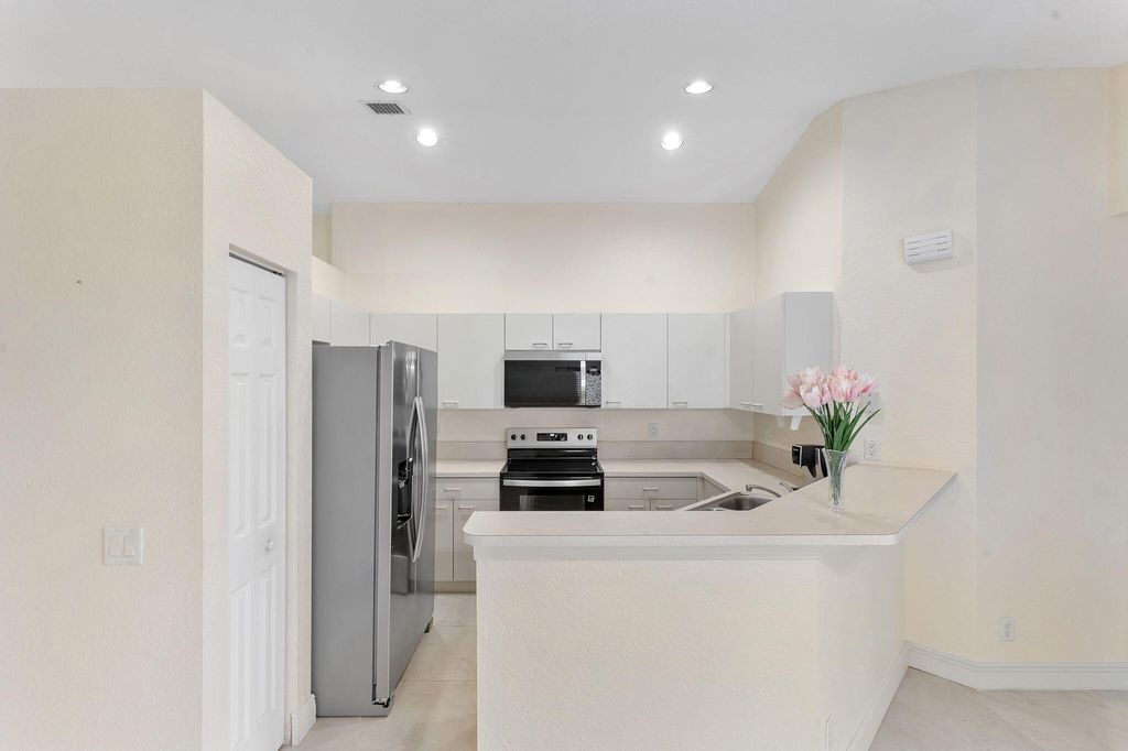 Photo of 1353 Canary Island Drive, Weston, FL 33327 (MLS # B26016200)