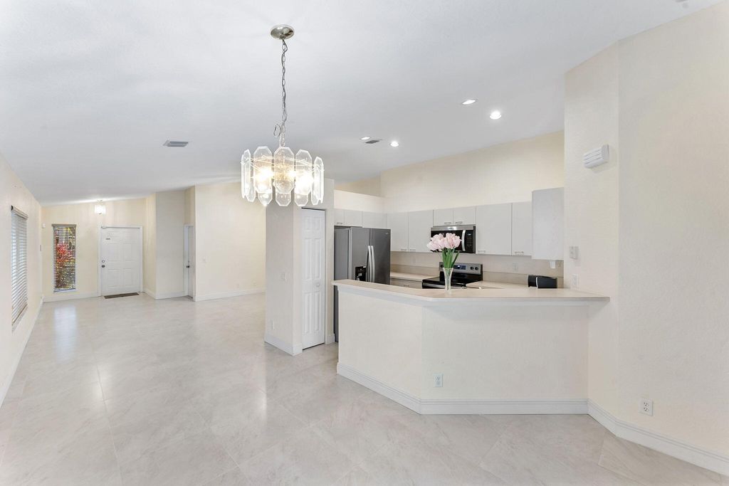 Photo of 1353 Canary Island Drive, Weston, FL 33327 (MLS # B26016200)