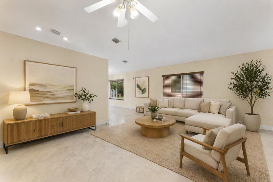 This beautifully upgraded 3-bed, 2-bath, 2-car garage single-story home in the sought-after Savanna community is truly turnkey. Enjoy an open-concept layout with large-format tile in common areas, laminate wood floors in all bedrooms, a bright kitchen with stainless steel appliances, and a stunning chandelier in the great room. The renovated primary suite features a walk-in closet and new walk-in shower. Impact glass sliding doors open to a freshly coated patio and fully fenced backyard with fruit trees and lush landscaping. Major updates: NEW ROOF, flooring, paint, gutters, appliances, epoxy garage floor — all 2022. Savanna offers resort-style amenities: pools, waterslide, mini golf, sports courts, fitness center & 24-hr guard gate.