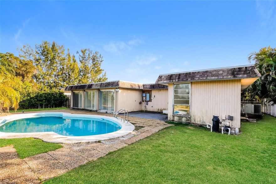 Beautifully updated 3-bedroom, 2-bath home with a large den, offering stunning lake views and a private pool. This spacious and versatile layout is perfect for both everyday living and entertaining. The modernized kitchen and bathrooms feature tasteful finishes, while the open living areas are filled with natural light and tranquil water views. Step outside, ideal for relaxing or hosting while enjoying serene lakefront sunsets. The oversized den provides flexible space for a home office, media room, or guest area. Additional highlights include generous bedroom sizes, ample storage, and a well-designed floor plan.Located in a desirable community close to shopping, dining, and major highways. Move-in ready and a rare lakefront pool home—don’t miss it!