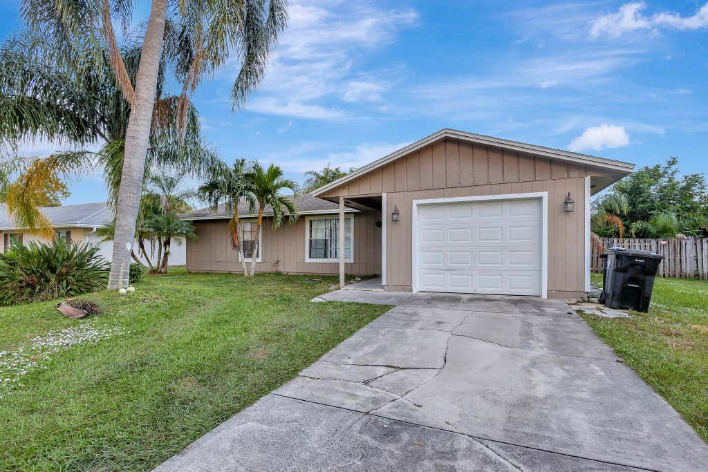 Photo of 1285 SW Avens Street, Port Saint Lucie, FL 34983 (MLS # R11046043)