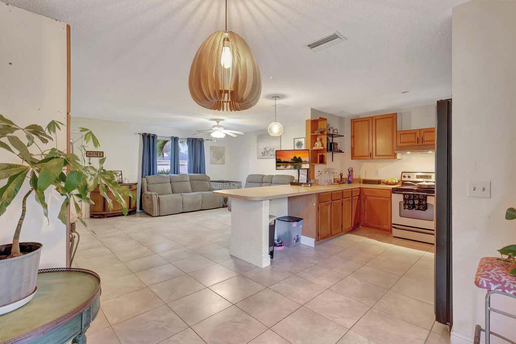 Photo of 1285 SW Avens Street, Port Saint Lucie, FL 34983 (MLS # R11046043)