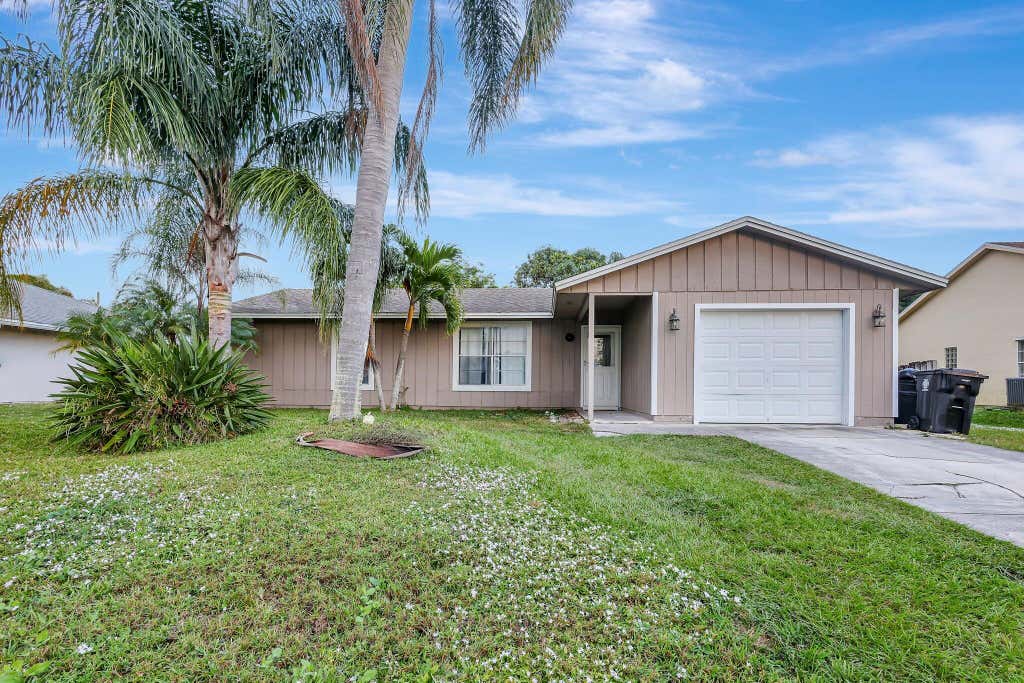 Photo of 1285 SW Avens Street, Port Saint Lucie, FL 34983 (MLS # R11046043)