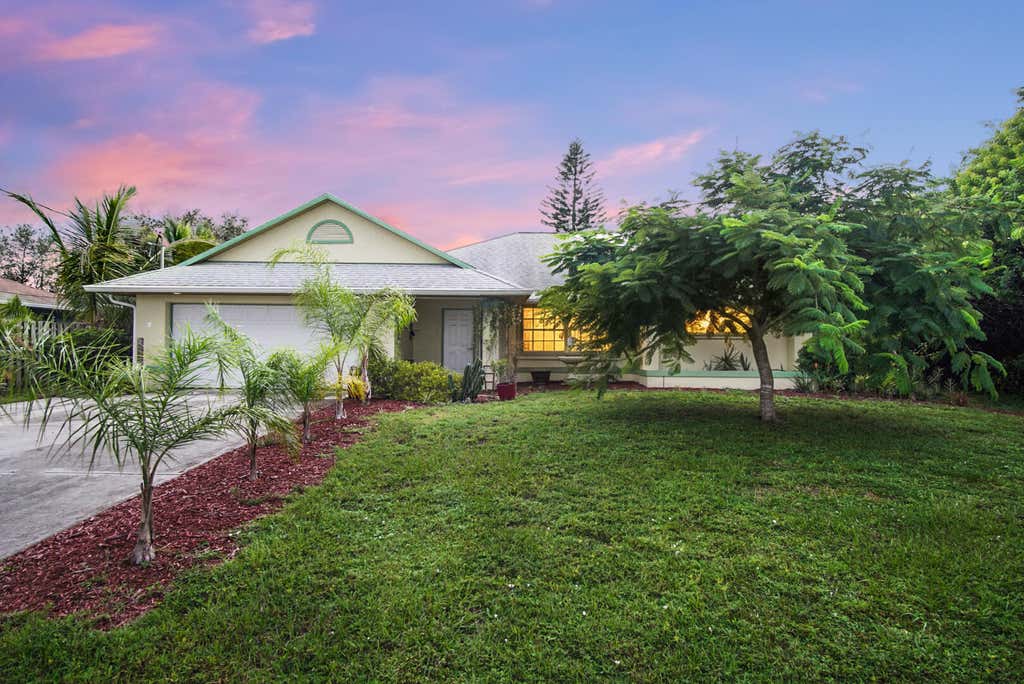 Photo of 566 SE Oakridge Drive, Port Saint Lucie, FL 34984 (MLS # R11128630)