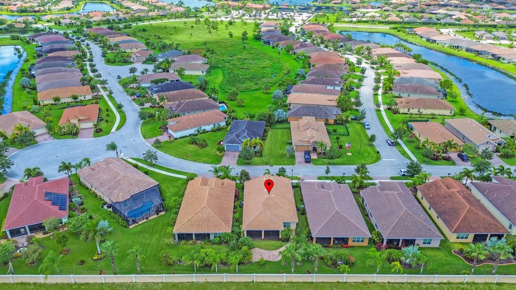 Photo of 9632 SW Royal Poinciana Drive, Port Saint Lucie, FL 34987 (MLS # R10945117)