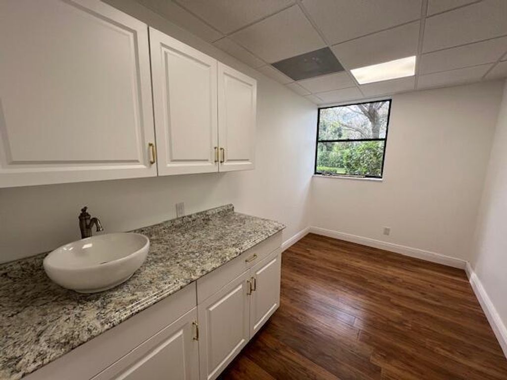 Photo of 10625 N Military Trail #105, Palm Beach Gardens, FL (MLS # R10993893)