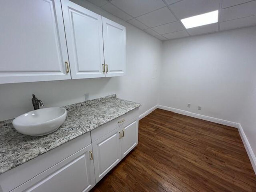 Photo of 10625 N Military Trail #105, Palm Beach Gardens, FL (MLS # R10993893)