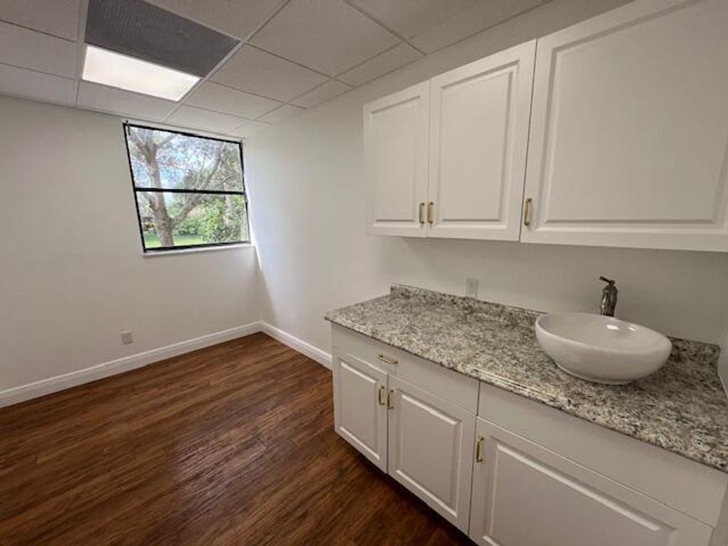 Photo of 10625 N Military Trail #105, Palm Beach Gardens, FL (MLS # R10993893)