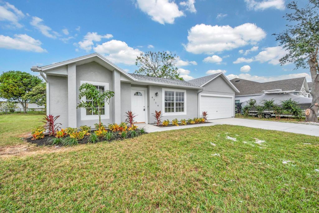 Photo of 4714 SW Yacolt Drive, Port St Lucie, FL 34953 (MLS # R10933737)