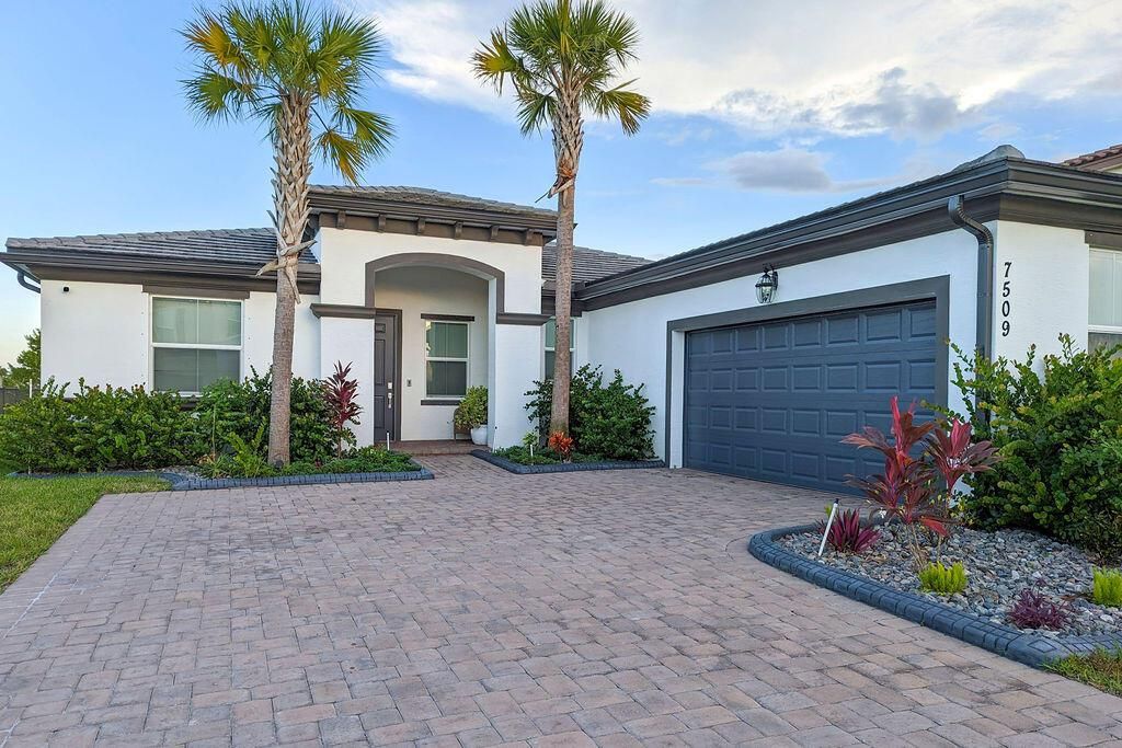 Photo of 7509 NW Farnsworth Circle, Port Saint Lucie, FL 34987 (MLS # R10977287)