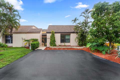 Photo of 11122 Curry Drive, Palm Beach Gardens, FL 33418 (MLS # B26033836)