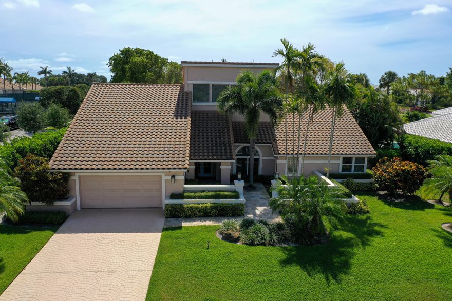 Welcome to this gorgeous one-story home featuring 3 bedrooms 3 full bathrooms, 1 half-bath, plus a private office. Situated on an oversized 15,000 sqft lot, this property offers a renovated private heated pool, spacious living areas, built-in closets and beautiful golf course views.  Upgrades include impact windows and a roof replaced in 2017.  Conveniently located near top-rated public and private schools, as well as shopping, grocery stores, pharmacies, restaurants and more. Located within an exclusive country club community with a mandatory membership, residents enjoy a fantastic lifestyle with exceptional amenities including a clubhouse, restaurant, fitness center, resort-style swimming pool, sauna, tennis and pickleball courts and much more. Don't miss this opportunity!!!