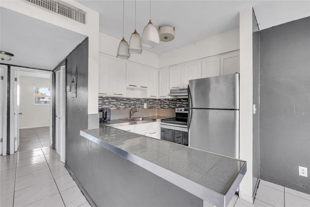 Photo of 4050 NE 12th Terrace #38, Oakland Park, FL 33334 (MLS # F10540858)