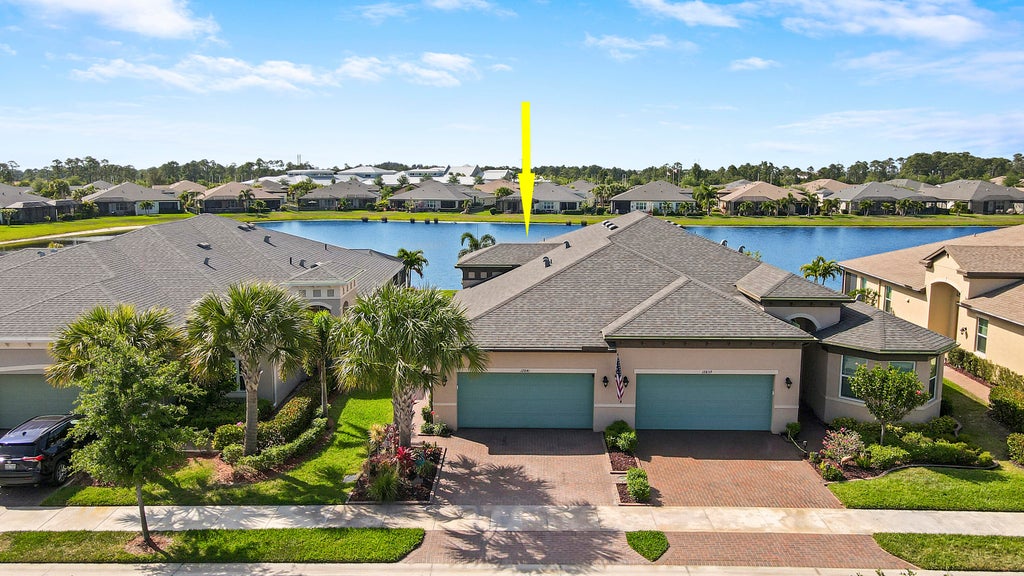 Photo of 12841 SW Lake Fern Circle, Port Saint Lucie, FL 34987 (MLS # R10974653)