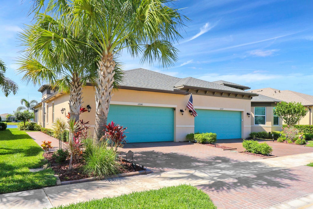 Photo of 12841 SW Lake Fern Circle, Port Saint Lucie, FL 34987 (MLS # R10974653)