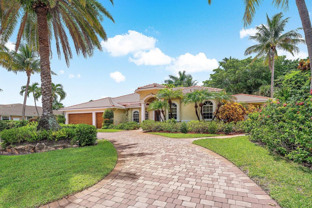 Photo of 589 N Country Club Drive, Atlantis, FL 33462 (MLS # R11120705)