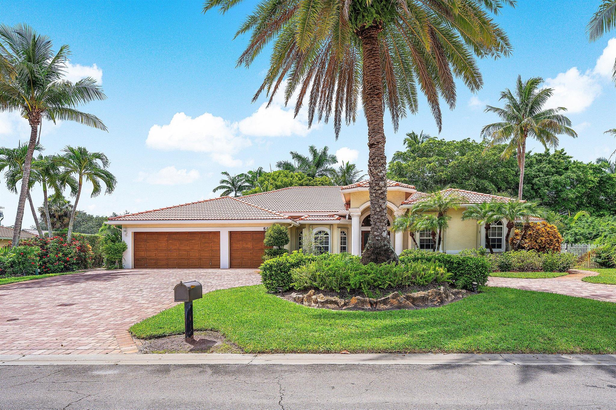 ***Unmatched in Atlantis - Dramatic Volume Ceilings & Private Oasis***Ambiance, privacy, and architectural drama define this 4-bedroom, 3-bathroom residence, positioned on a premium corner lot in the sought-after City of Atlantis. Built in 2000 and surrounded by mature trees and lush landscaping, the home blends elegance and comfort in a setting designed for both relaxation and entertaining.