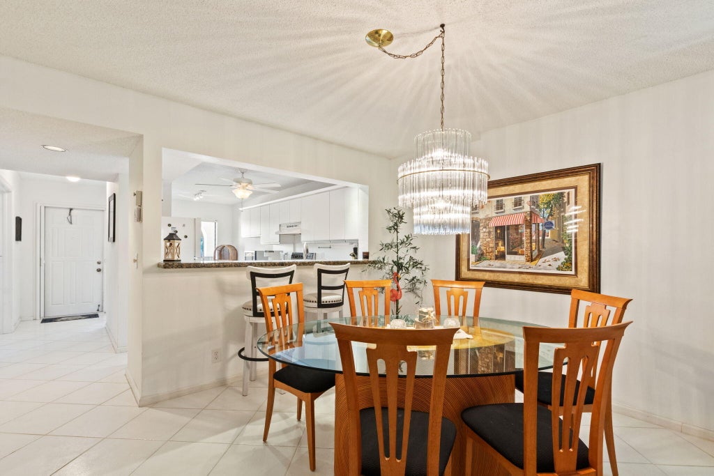 Photo of 5380 CEDAR LAKE Drive #303, Boynton Beach, FL 33437 (MLS # B26078560)