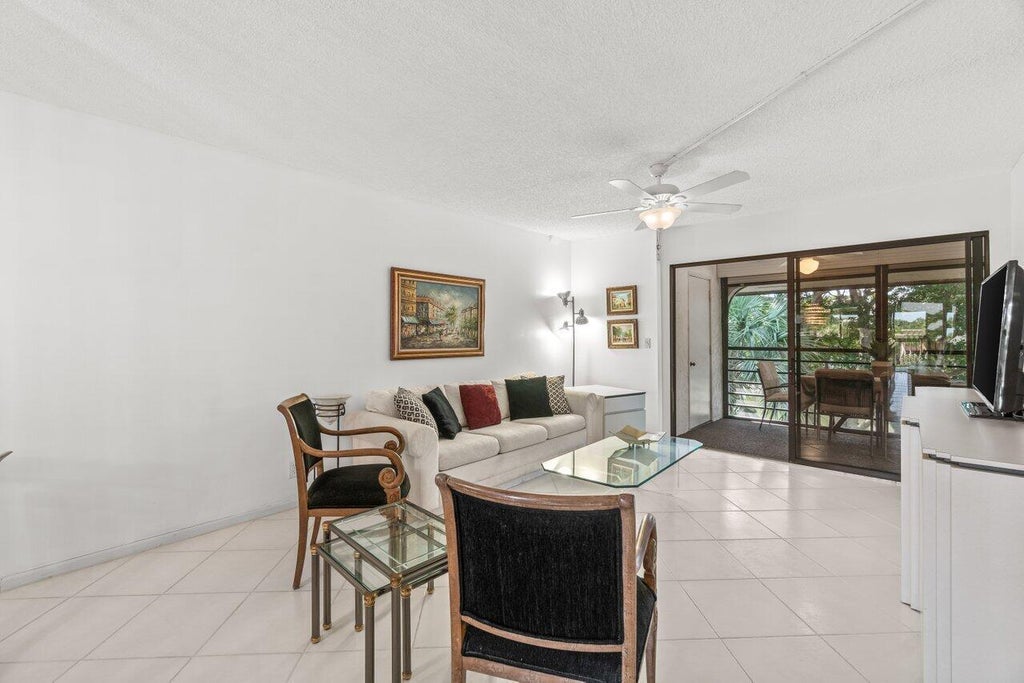 Photo of 5380 CEDAR LAKE Drive #303, Boynton Beach, FL 33437 (MLS # B26078560)